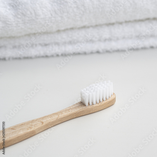 Arrangement with towels and toothbrush photo
