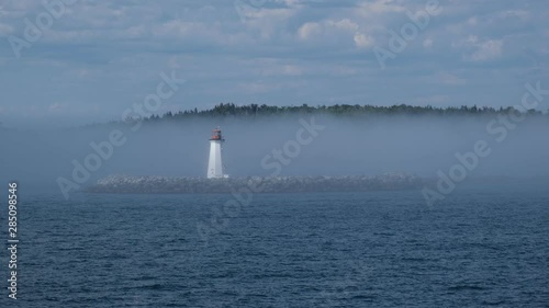 Halifax lighthouse with an approaching fogbank