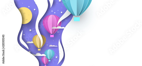 Papercut hot air balloon background on night sky