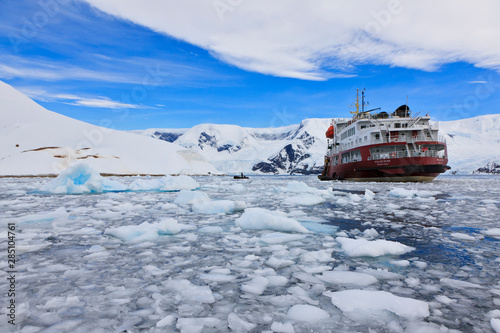 South Atlantic Ocean, Antarctica, Antarctic Peninsula, Gerlache Strait, Neko Harbor, Polar star icebreaker cruise ship between ice on sea photo