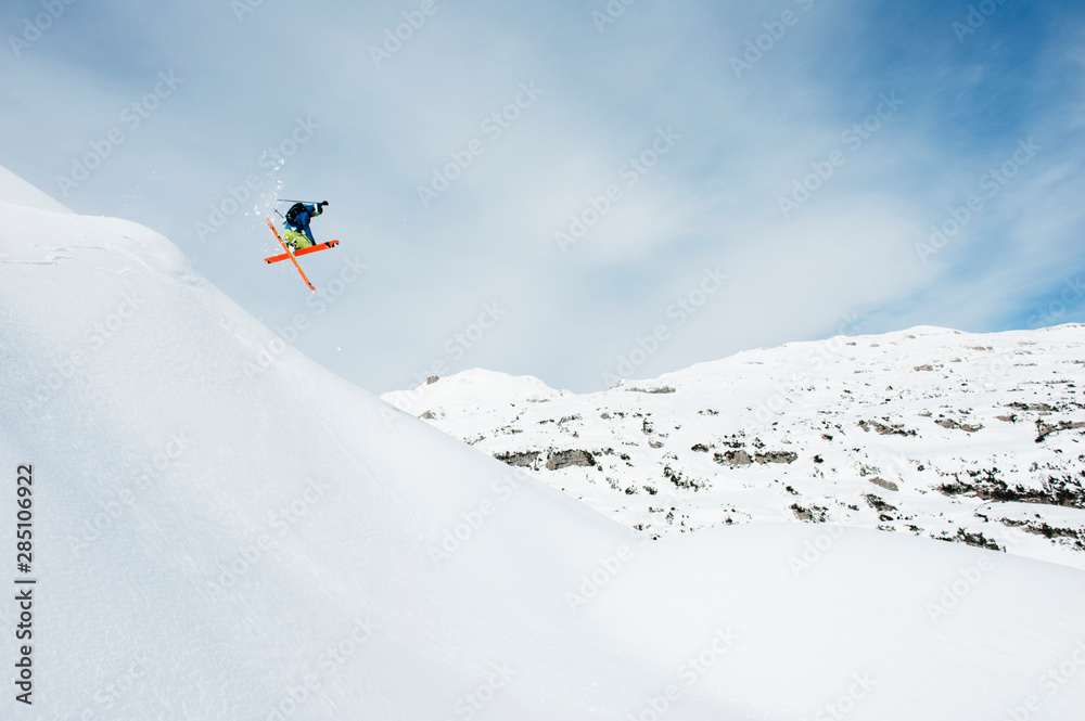 Austria, Kleinwalsertal, Male skier jumping mid-air Austria, Kleinwalsertal, Male skier jumping mid-air