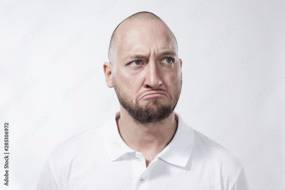Man with sceptic look, portrait Man with sceptic look, portrait