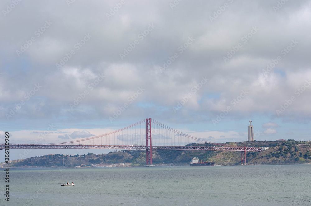 Fototapeta premium 25th of April Suspension Bridge over the Tagus river in Lisbon, Portugal