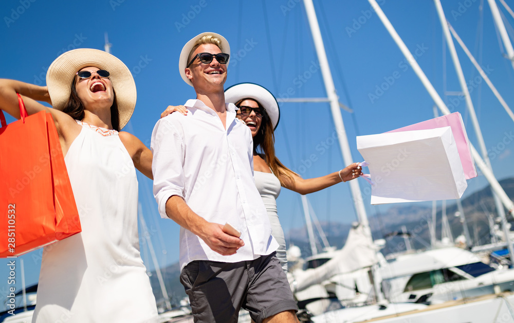 Happy people enjoying and having fun on a luxury summer vacation