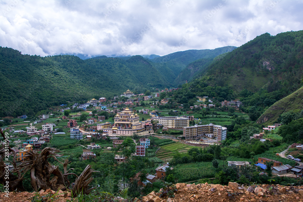 Beautiful small town from Nepal covered by hills
