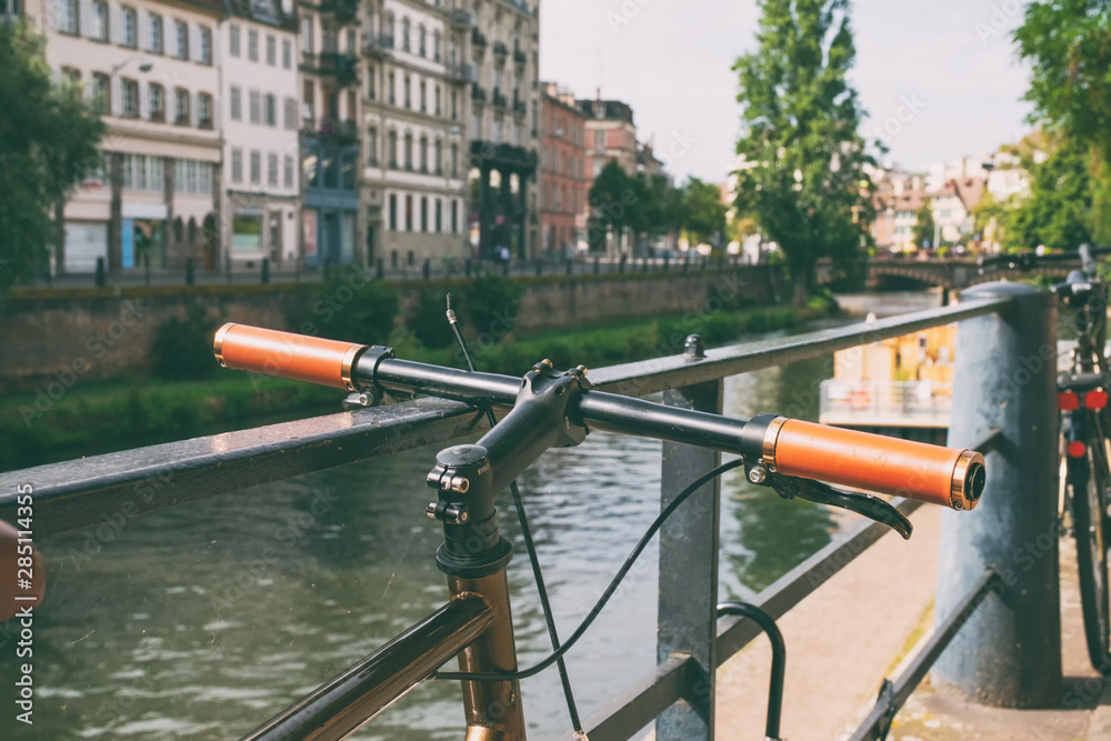 bicycle wheel on the background of the river in strasbourg bicycle wheel on the background of the river in strasbourg