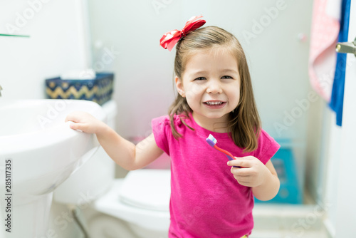 Small Girl Taking Care Of Her Dental Health At Home