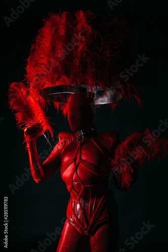 Man performing with awesome and strange red uniform