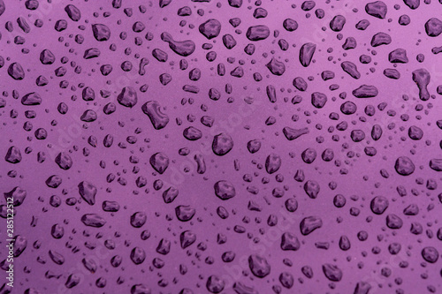 Abstract background with water drops on metal surface