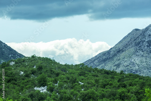 Beautiful mountain landscape on sunny summer day. Montenegro, Albania, Bosnia, Dinaric Alps Balkan Peninsula. Сan be used for postcards, banners, posters, posters, flyers, cards.