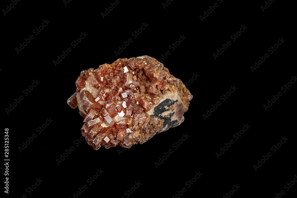 Macro mineral stone Vanadinite on a black background