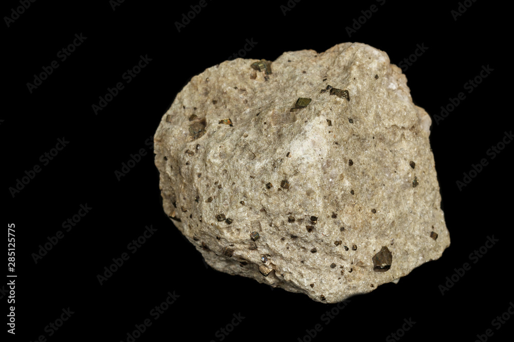 Obraz premium Macro mineral stone Pyrite on a black background