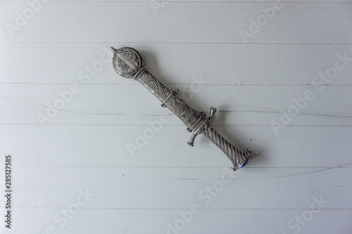 Dagger with holster on white background