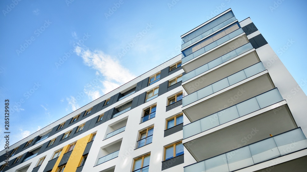 Multistory new modern apartment building. Stylish living block of flats. Multistory new modern apartment building. Stylish living block of flats.
