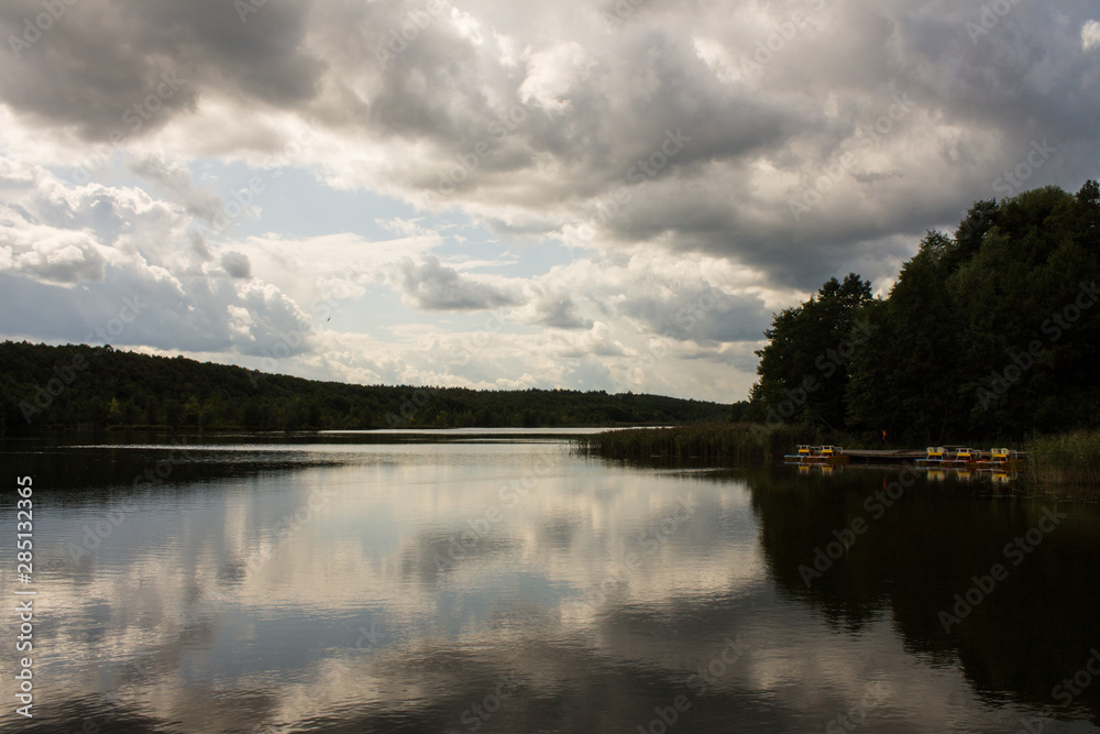 Summer landscape with green trees and reflections in the river Russia Summer landscape with green trees and reflections in the river Russia