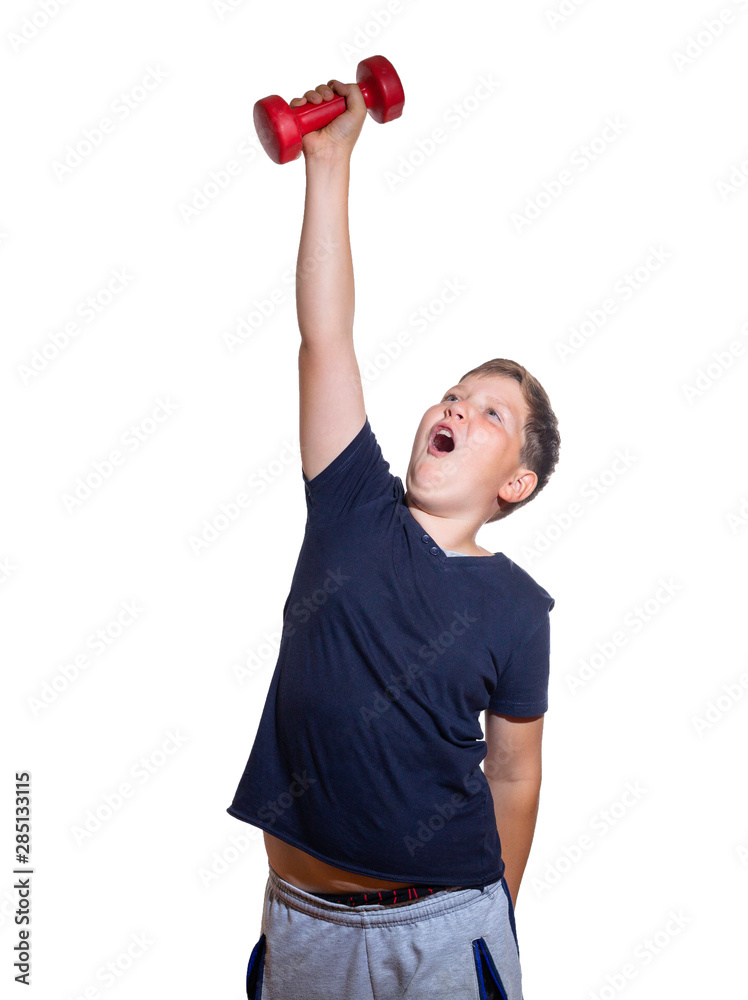 boy lifts up a red dumbbell and screams. Kid workout concept