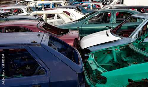 A scrap yard full of car wrecks that were cleared from interior © mino21