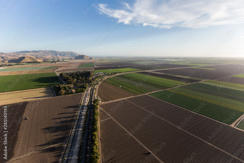 Aerial view of farm fields and Santa Monica Mountains hilltops near Camarillo in Ventura County, California. 