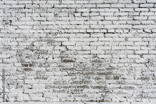 Empty Old Brick Wall Texture. Painted Distressed Wall Surface. Grungy Wide Brickwall. Shabby Building Facade With Damaged Plaster.