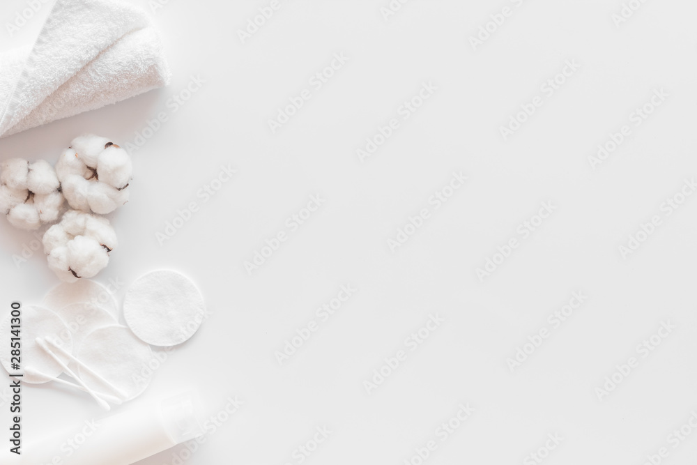 Hygiene cotton swabs, pads and cream for pattern on white background top view mock up Hygiene cotton swabs, pads and cream for pattern on white background top view mock up