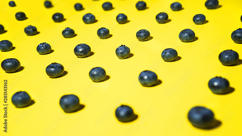 Fresh blueberry pattern on yellow background.