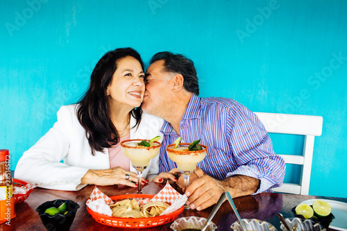 Mature husband kissing his wife, Mexico