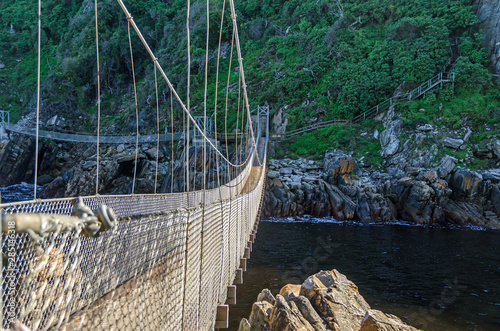 Suspension footbridge over the Storms River in the Tsitsikamma National Park in South Africa
