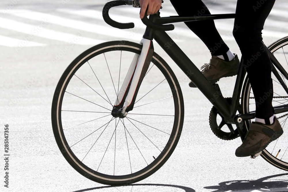 cyclist rides on the highway. sport and health. cyclist rides on the highway. sport and health.