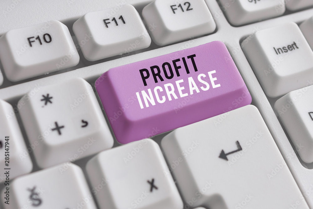 Word writing text Profit Increase. Business photo showcasing the growth in the amount of revenue gained from a business White pc keyboard with empty note paper above white background key copy space Word writing text Profit Increase. Business photo showcasing the growth in the amount of revenue gained from a business White pc keyboard with empty note paper above white background key copy space