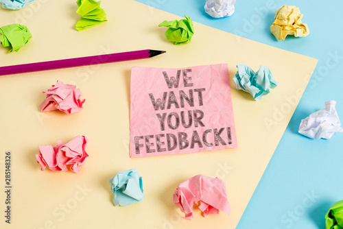 Conceptual hand writing showing We Want Your Feedback. Concept meaning criticism given someone say can be done for improvement Colored crumpled papers empty reminder blue yellow clothespin © Artur