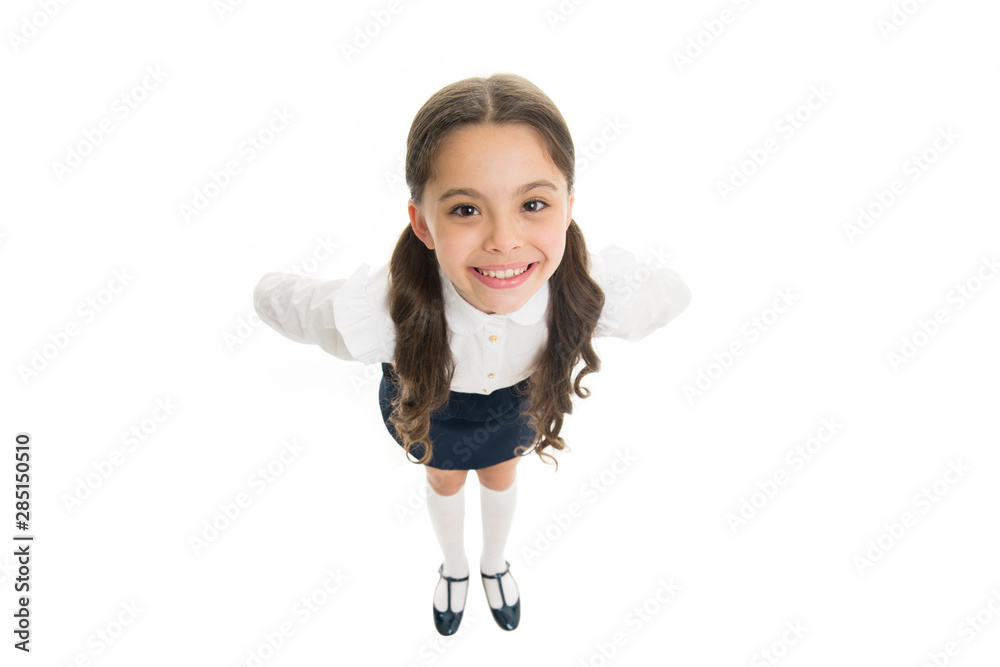 Pupil of first grade. School uniform. Back to school. Student little kid adores school. Smiling schoolgirl. Celebrate knowledge day. September time to study. Girl cute pupil on white background Pupil of first grade. School uniform. Back to school. Student little kid adores school. Smiling schoolgirl. Celebrate knowledge day. September time to study. Girl cute pupil on white background