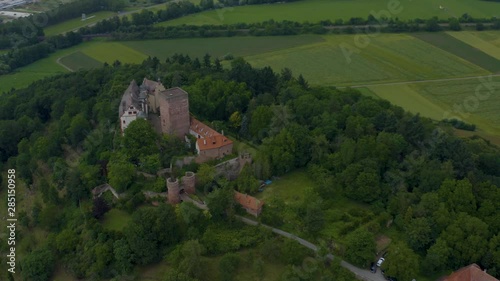 Aerial view of the  village and castle Gamburg in Germany.  Pan to the left around the castle from behind. photo