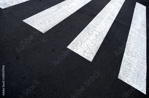 Pedestrian zebra crossing in angular perspective with empty space for text.
