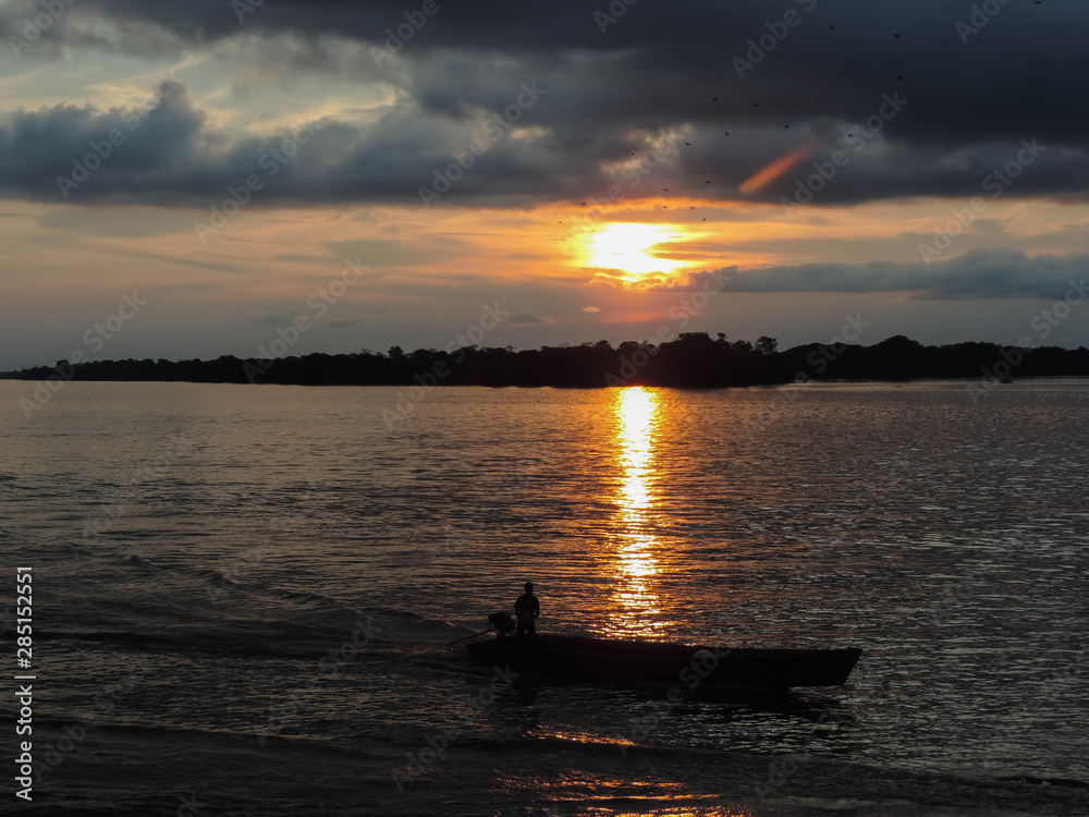 sunset on the amazon river