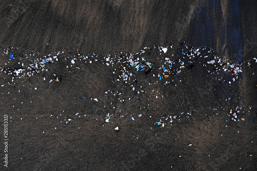 Microplastics pollution on an ocean beach.