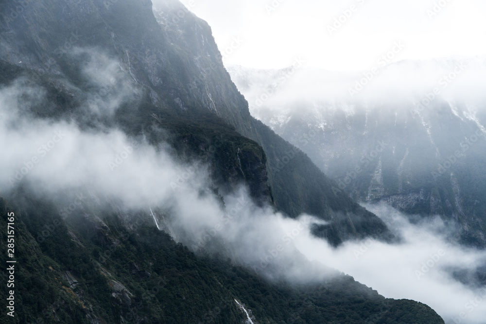 low Cloud hanging over the mountains in Milford Sound