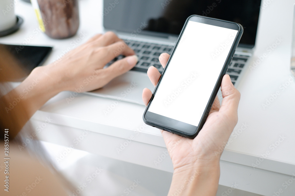 Mockup image of Beautiful woman shopping online with smartphone on online websites, mockup concept