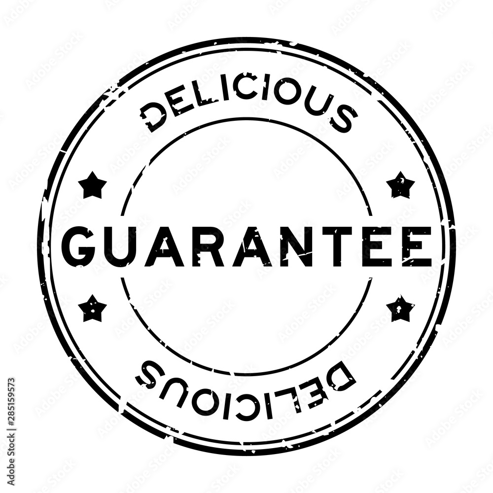 Grunge black guarantee delicious word round rubber seal stamp on white background