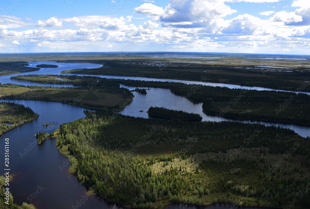 Aerial view from the sky by helicopter of the Opinaca Reservoir lakes (Quebec, Canada)