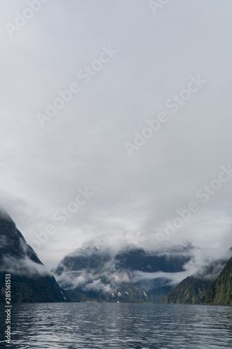 Clouds and mountains and ocean in Milford Sound