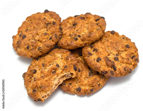 Oatmeal round cookies with chocolate. Isolated on a white background with a clipping path.