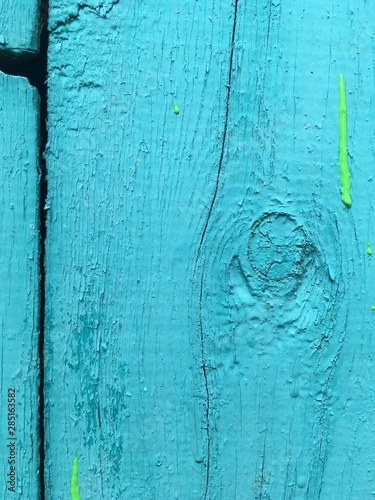 BLUE SURFACE OF THE BOARD, KNOB, DROP OF PAINT
