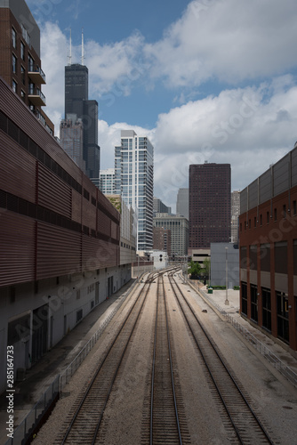 chicago skyline along train tracks