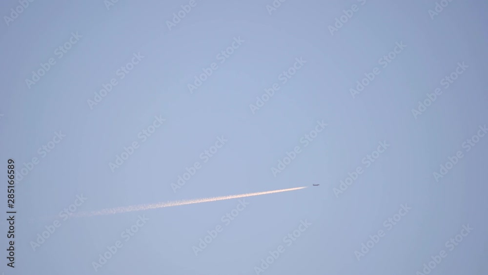 Contrails of a passenger aircraft Contrails of a passenger aircraft