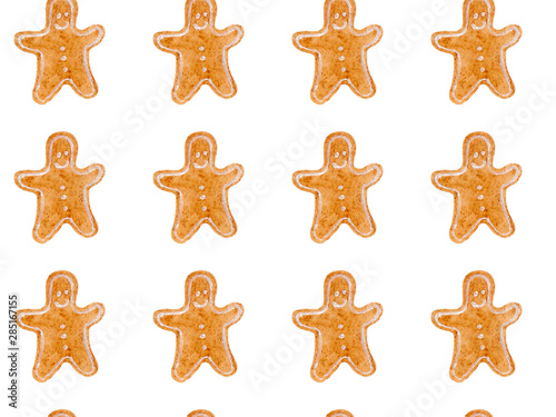 Seamless watercolor pattern with brown christmas gingerbread men. New year festive background. Template for fabric or wrapping paper print. Hand drawn illustration. Christmas food decoration objects.