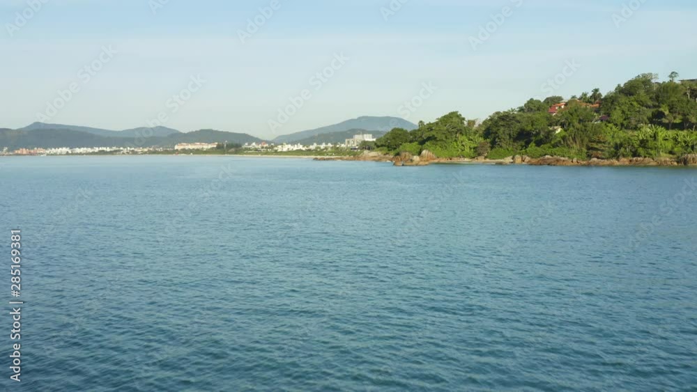 Aerial drone view approaching Jurere Internacional beach, Santa Catarina, Brazil Aerial drone view approaching Jurere Internacional beach, Santa Catarina, Brazil