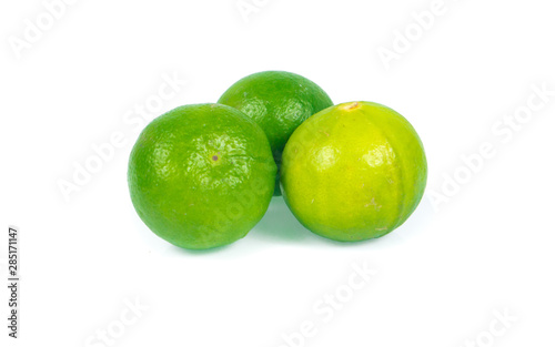 green lemon isolated on white