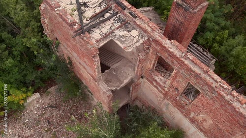 Shot revealing ruins of an old building. photo