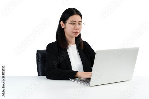 Businesswoman working at her office via laptop . isolated white background.