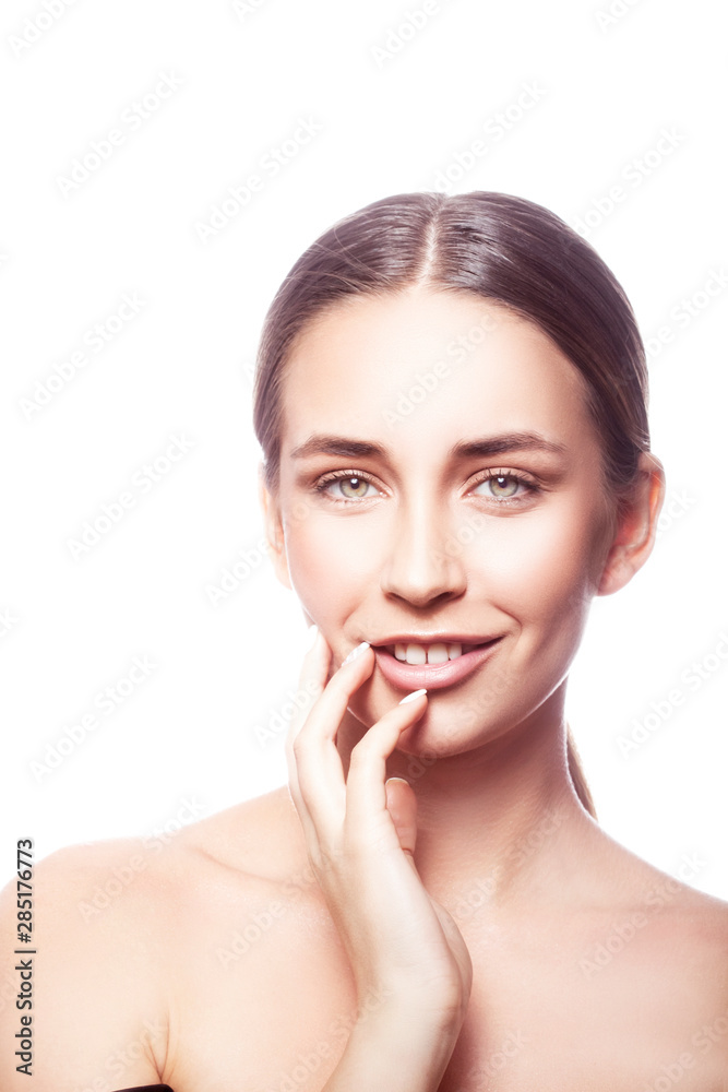 portrait of young woman with perfect skin, happy smiling. Copy space. White background portrait of young woman with perfect skin, happy smiling. Copy space. White background